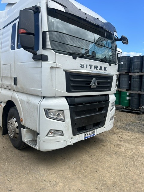 White Sitrak prime mover parked in the yard ahead of brand-specific Sitrak repairs