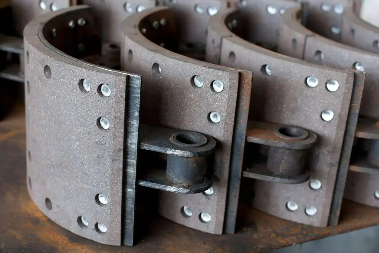 Set of riveted heavy vehicle brake shoes ready for fitting