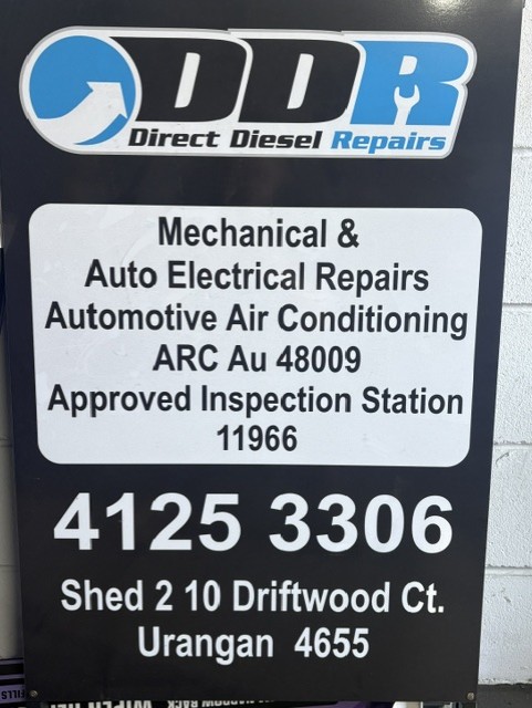 Direct Diesel Repairs sign board listing mechanical, auto electrical and inspection station accreditations in Urangan