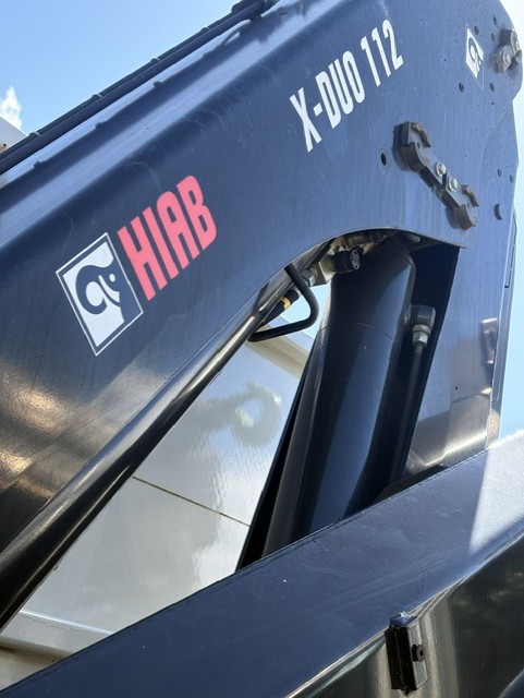 HIAB X-DUO 112 truck crane boom and hydraulic ram inspected during crane repairs